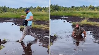 Dude unknowingly falls into crazy hidden sinkhole