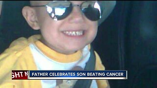Father celebrates son beating cancer