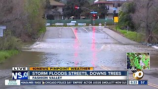 Rain leads to street near Fashion Valley