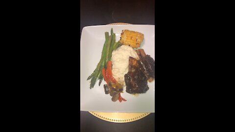 Mashed potatoes with beef ribs and veggies