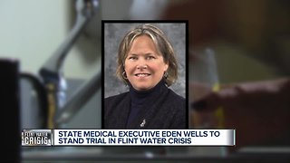 Michigan's medical chief to stand trial on Flint manslaughter charges