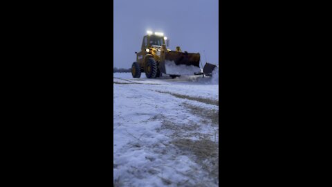 Plowing snow with a front end loader