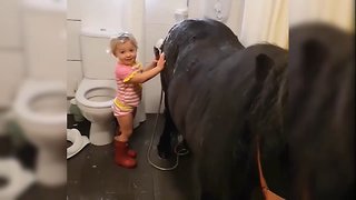 Toddler Give A Pony Shower in The Bathroom