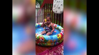 Little Girl Talks with Rubber Ducky