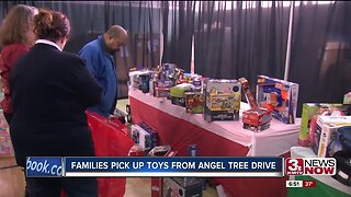Families Pick Up Toys From Angel Tree Drive