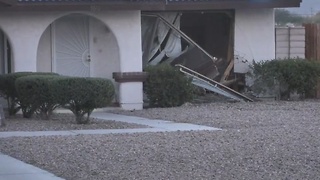 Car crashes into a house