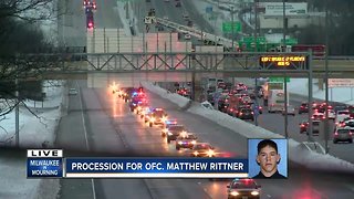 Prospective police officer emotional as fallen MPD Officer Matthew Rittner procession passes by