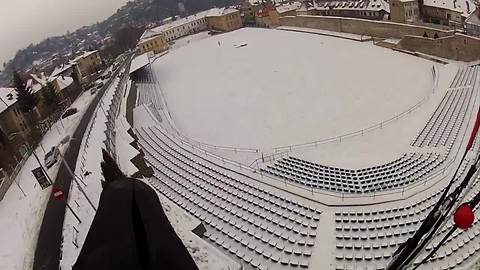 Nerve-recking BASE jump off an icy antenna!