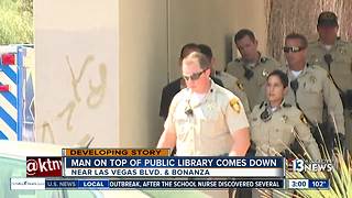 Man threatens to jump off library