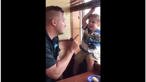 1-year-old humorously argues with his dad