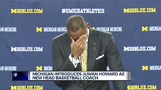 Juwan Howard cries tears of joy as he's introduced as Michigan basketball coach