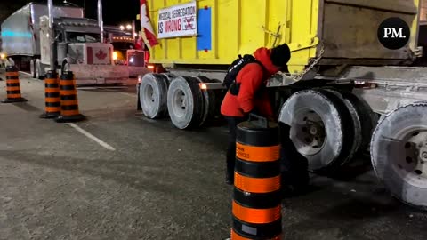Freedom Convoy Truckers Protesters cleaning up garbage in the streets of Ottawa