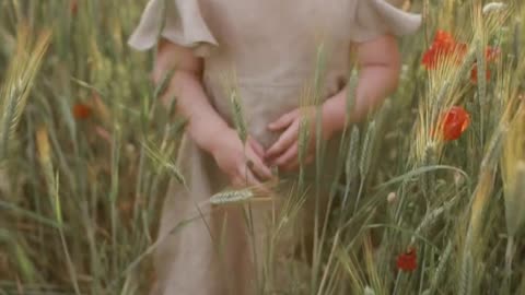 Baby Girl Walking Alone In Flower Garden/Royalty Free Video/No Copyright Video