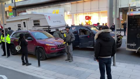 Police in Ottawa smash windows