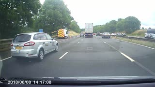 Dashcam Captures Crash Involving Car and Semi-Truck