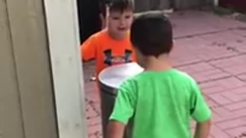 Kids Jokingly Hit Each Other With Trash Can's Lid by Stepping on It's Pedal - 1069518