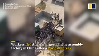 Chinese workers flee world’s largest iPhone factory after Covid outbreak