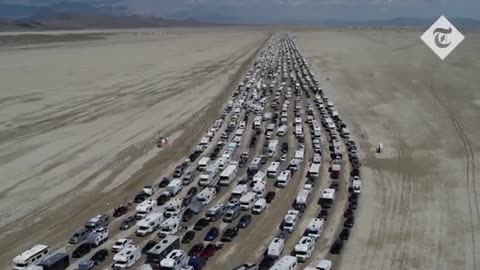 Thousands leave Burning Man festival after being trapped by washout