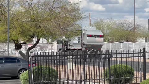 Garbage trucks leaving and entering WM Harbor Transfer Station and Okemah Service Center.