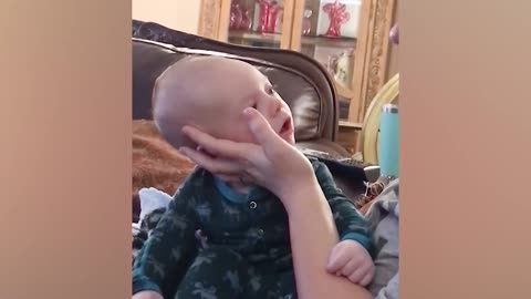 Cute Baby Playing With Mommy