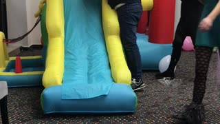 Baby On Slide Takes A Spill