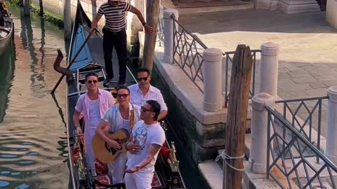 Four Brothers Singing on the Gondola in Venice