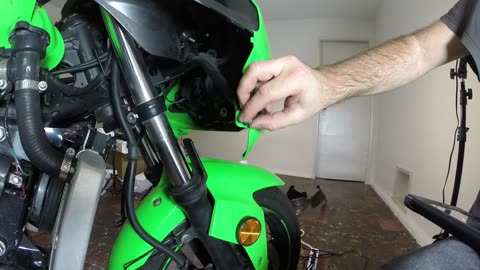 How to Replace a Headlight Bulb on a 2011 Ninja 250