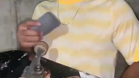 Putting ignited steel wool under a skateboard