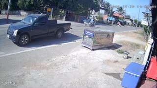 Large Box Falls Out of Pickup Truck Bed