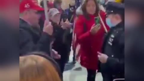 Female cop loses her marbles at Trump supporters.