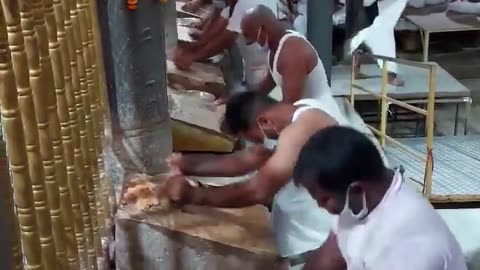 Grinding of sandalwood paste for Sri Varaha Narasimha at Simhachalam temple.
