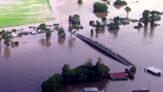 Floodwater submerges Australian towns forcing evacuations