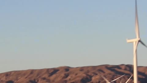Giant windmills in the California desert doing nothing