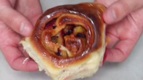 "Step up Your Brunch Game with Delectable Plum Cinnamon Rolls: A Twist of Flavors in Every Bite!"