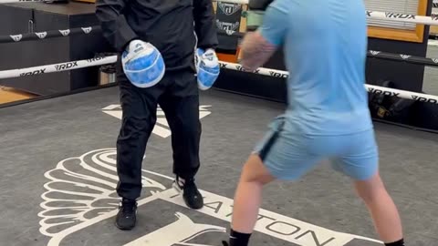 Ricky Hatton on the pads with son Campbell Hatton