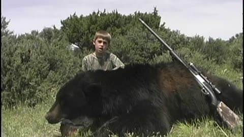 Kid Shoots Big Black Bear