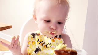 My Adorable Granddaughter Enjoying Her First Birthday Cupcake