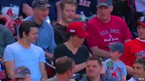 A foul ball was given to a young teenager in the audience and look what he did with it.