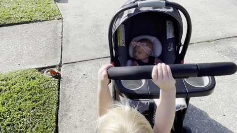 Toddler Pushed His Baby Sister in her Stroller
