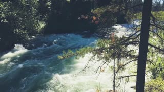 Running water in a view of a waterfall in nature