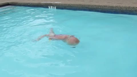 Jack swims solo in the pool