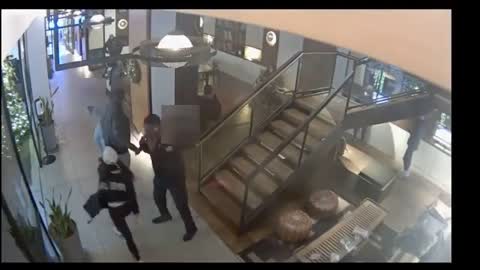 NYPD releases video of woman attacking Keyon Harrold Jr.