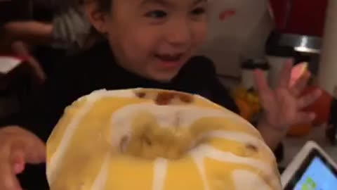 Toddler tries the real Mango Bango doughnut