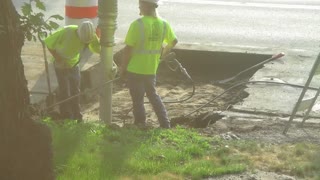 Vacuuming to Make a Hole in the Road