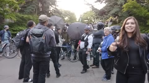 Antifa Dox Jonathan Choe Address on Umbrella top, it gets taken