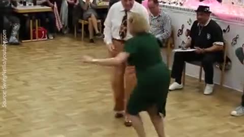 Aging couple steals the show with a rock and roll dance.