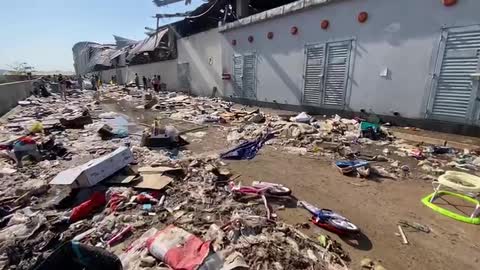 South Africa looting, destruction and cleaning up at Massmart