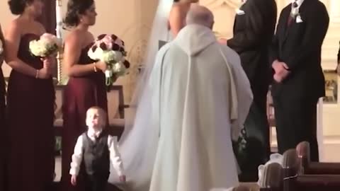 Children add a little comedy to the wedding! "The Ring Bearer is failing. It's a fiasco."