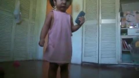 Adorably cute 2 year old plays in her room
