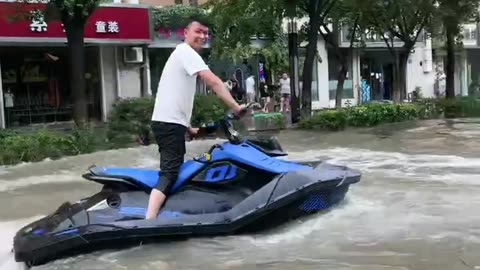 Jet Skiing Through Flooded Streets